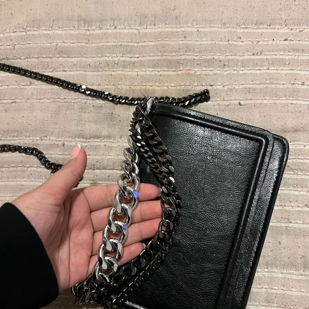 Black small bag with silver chair detail from Zara